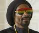 Snoop Lion dans le clip de Here Comes The King (feat. Angela Hunte).