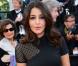 Leïla Bekhti, habillée d'une robe Victoria Beckham, monte les marches du Palais Des Festivals pour la projection du film Le Passé. Cannes, le 17 mars 2013.