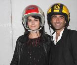 Olivier Benkemoun et sa compagne (et leurs casques !) à la soirée des 30 ans de Diesel, le 11/10/08