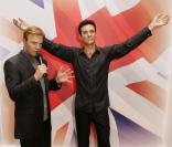 Les statues de cire de Gary Barlow et de Robbie Williams au musée Madame Tussauds