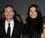 Karen Minier et David Coulthard au défilé homme Hugo Boss, le 22/01/09