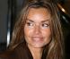 Ingrid Chauvin, très en beauté et bien accompagnée au défilé Franck Sorbier....