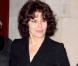 Fanny Ardant, très discrète dans son ensemble noir, encore en deuil... 