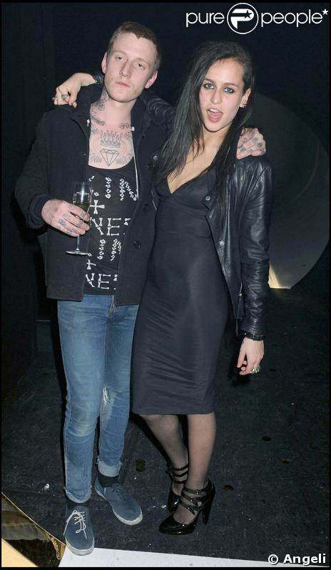 Alice Della et un ami à la soirée Moët et Chandon à Londres hier soir