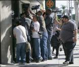 Les photographes attendent Paris Hilton 25/03/09