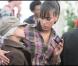 Amel Bent et un enfant malade, lors de la 4e édition de "Foot-Concert", qui s'est tenue à Lyon le 27 mars 2009 !