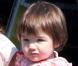Suri a un an en mai 2007 et rejoint sa maman sur le tournage de son film, Mad Money, à Shreveport dans le sud des Etats-Unis. Elle aime déjà le rose et sa coupe de cheveux annonce le carré !