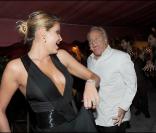 Lola Karimova-Tillyaeva et Massimo Gargia à la soirée Bacardi, à Saint-Tropez. 26/07/09