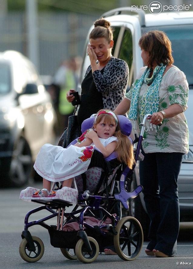 Coleen Rooney, sa mère et sa petite soeur arrivent au match amical Manchester Uited / FC Valence (UK, 5 août)