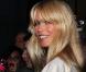 Claudia Schiffer très en beauté lors du défilé de la collection printemps/été 2010 prêt-à-porter d"Yves Saint Laurent, à l"occasion de la Fashion Week parisienne, au Palais de Tokyo, le 5 octobre !