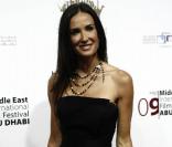 Demi Moore est venue sans son mari Ashton Kutcher à la cérémonie du 3e Festival international du film du Moyen-Orient. Une célibataire radieuse !<br />