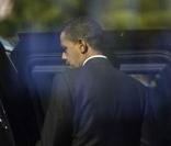 Barack Obama sort de la trésorerie à  Washington DC le 21 octobre 2009
