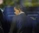 Barack Obama sort de la trésorerie à  Washington DC le 21 octobre 2009