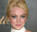 Lindsay Lohan en mode star d'Hollywood. Beaucoup trop de flashes pour une si jeune fille... 