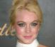 Lindsay Lohan en mode star d'Hollywood. Beaucoup trop de flashes pour une si jeune fille... 