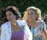 Courteney Cox et Busy Phillips sur le tournage de la série Cougar en mars 2009 