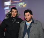 Mustapha El Atrassi et Mouloud Achour, à l'occasion de la grande soirée Toshiba organisée au Palais de Tokyo, à Paris, le 14 décembre 2009.