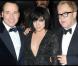 David Furnish et Elton John entourent une Lily Allen, très décolletée lors de la soirée de gala Grey Goose Vodka  - character &amp; cocktails - à Londres, au profit de la fondation Elton John le 23 décembre 2009