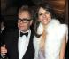 Au côté d'Elizabeth Hurley, même Elton John ne sait plus où donner de la tête, elle est tellement ravissante lors de la soirée de gala Grey Goose Vodka  - character &amp; cocktails - à Londres, au profit de la fondation Elton John le 23 décembre 2009