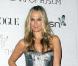 Après s'être pavanée dans un ravissant bikini, Molly Sims a opté pour une vraie robe de sirène lors du gala de charité The Art of Elysium's le 16 janvier 2010 à Los Angeles