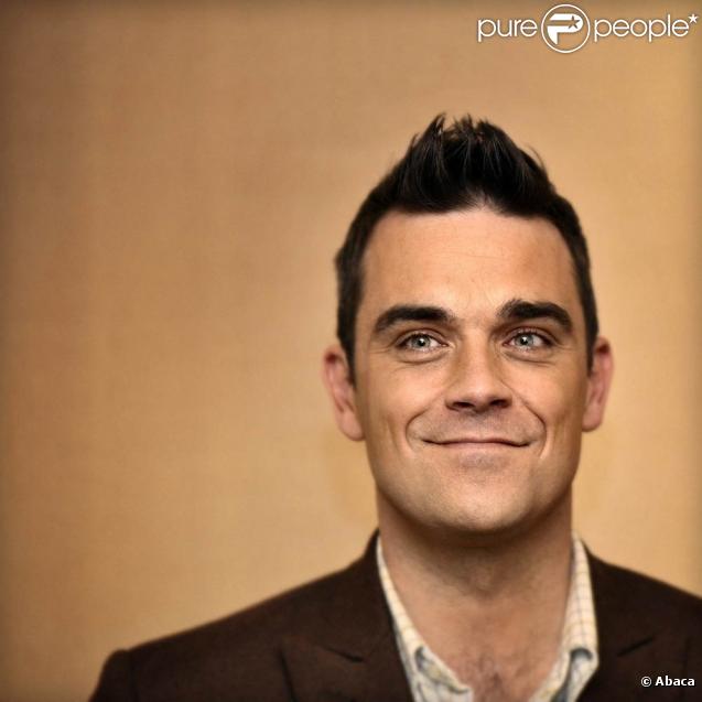 L'initiative Helping Haïti-Everybody Hurts pilotée par Simon Cowell a rassemblé 21 stars, dont Robbie Williams 