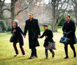 Barack et Michelle Obama, accompagnés de leurs enfants Sasha et Malia 
