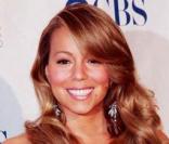 La diva Mariah Carey, est elle aussi partie de ces stars qui tout au long de l\'année s\'affiche avec un teint doré qui fait à chaque fois des envieux.<br />