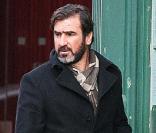Eric Cantona en visite éclair à Manchester, le 22 mars 2010 !