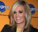 La ravissante Carrie Underwood avec Woofy, le Biggle qu'elle a adopté à l'occasion du 6e Annual Pedigree Adoption Drive, qui s'est tenu au Bidawee Manhattan Sheter de New York, le 30 mars 2010.