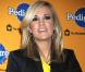 La ravissante Carrie Underwood avec Woofy, le Biggle qu'elle a adopté à l'occasion du 6e Annual Pedigree Adoption Drive, qui s'est tenu au Bidawee Manhattan Sheter de New York, le 30 mars 2010.