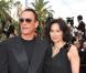 Jean-Claude Van Damme et une amie sur le tapis rouge pour l'ouverture du festival de Cannes le 12 mai 2010