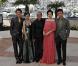 Le réalisateur Wang Xiaoshuai avec les actrices Fan Bingbing et Li Feier ainsi que les acteurs Qing Hao et Zi Yi pour le photocall de Chongqing Blues lors du festival de Cannes le 13 mai 2010