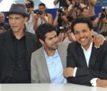 Roschdy Zem, Jamel Debbouze et Sami Bouajila lors du photocall du film Hors-la-loi le 21 mai 2010 durant  le festival de Cannes