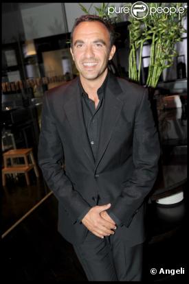 Nikos au premier anniversaire de l'Hôtel Renaissance Paris Arc de Triomphe, le 14 juin 2010.