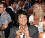 Silver Clef Awards à Londres, le 2 juillet 2010 : Slash, Ronnie Wood et Anna Araujo