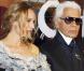 Karl Lagerfeld et Diane Kruger à l'occasion de la réouverture de la boutique Chanel du quartier de Soho, dans le cadre du Mercedes Benz Fashion Spring 2010, à New York, le 9 septembre 2010.