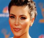 Loin de la petite fille sage qu'elle était, Kim Kardashian est aujourd'hui une vraie femme fatale !  