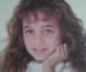 Adorable petite fille à bouclettes, elle a depuis changé plus d'une fois de coiffure !  