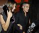 George Clooney et Elisabetta Canalis à la sortie du restaurant Nobu, à Milan. 27/09/2010