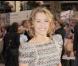 Miley Cyrus à la première d'Hanna Montana, avec une robe Hervé Leger by Max Azria, à Londres le 23 avril 2009