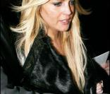 Lindsay Lohan mise sur l'eau plate