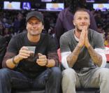 David Beckham pris en flag