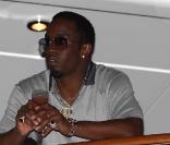 Sean P. Diddy Combs, son ex Kim Porter et leurs jumelles D'Lila Star and Jessie James s'éclatent lors d'un concert de Macy Gray sur le yacht du rappeur durant les fêtes de fin d'année à Gustavia, Saint-Barthélemy en fin 2010 