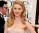 Dianna Agron de la série Glee a brillé dans une robe poudrée J. Mendel assortie à une minaudière Ferragamo. Elégance et retenue pour la glamour comédienne.  