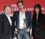 Roman Polanski, Christopher Thompson et Maria de Medeiros, à l'occasion de la cérémonie du Prix Henri-Langlois, à Vincennes, le 31 janvier 2011.