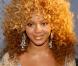 Beyoncé ose la coupe afro et la couleur rousse pour un esprit seventies... qui ne lui va pas forcément ! 