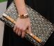 Hilary Duff porte une ravissante pochette Goyard lors de la soirée de lancement du livre de Kimberly Snyder The Beauty Detox Solution à l'Hôtel The London Rooftop à Los Angeles le 13 avril 2011
