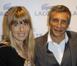 Nagui et son épouse Mélanie Page lors de la soirée d'ouverture du flagship Lacoste sur les Champs-Elysées à Paris le 28 avril 2011