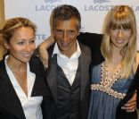 Anne-Sophie Lapix, Nagui et son épouse Mélanie Page lors de la soirée d'ouverture du flagship Lacoste sur les Champs-Elysées à Paris le 28 avril 2011