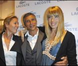 Nagui entouré de sa femme Mélanie Page et d'Anne-Sophie Lapix lors de la soirée d'ouverture de la boutique Lacoste 95 avenue des Champs Elysées à Paris, le 28 avril 2011